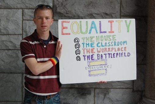 Bradley Manning with Equality Poster.